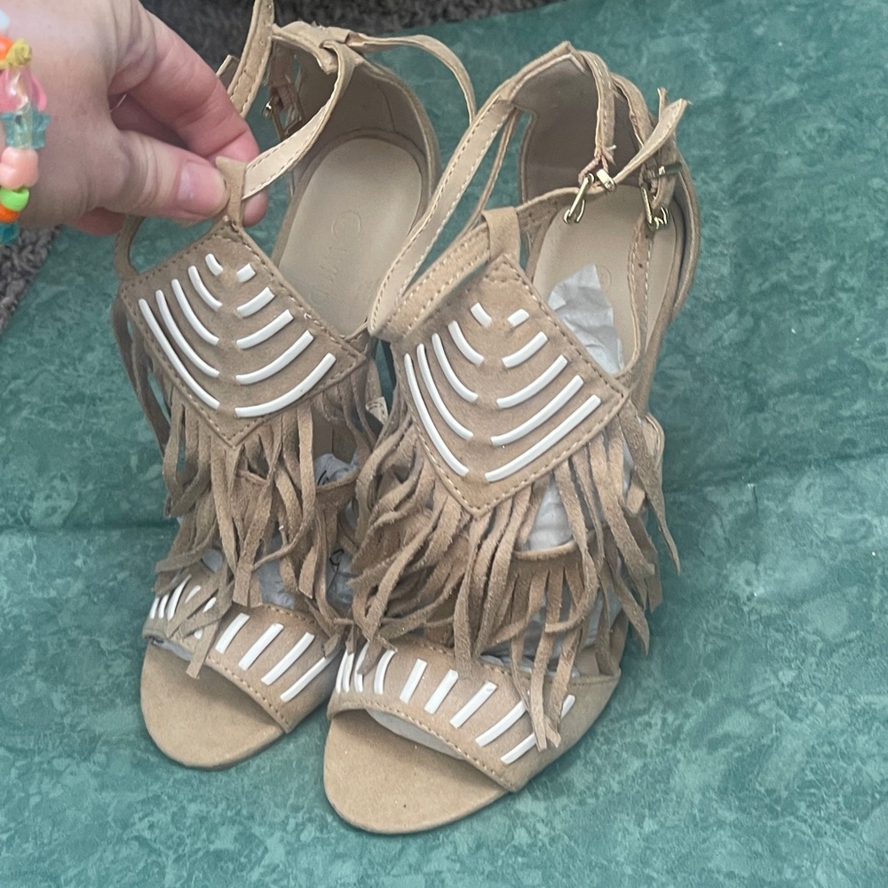 Wild divia size 5.5 tan fringe high heels never been worn